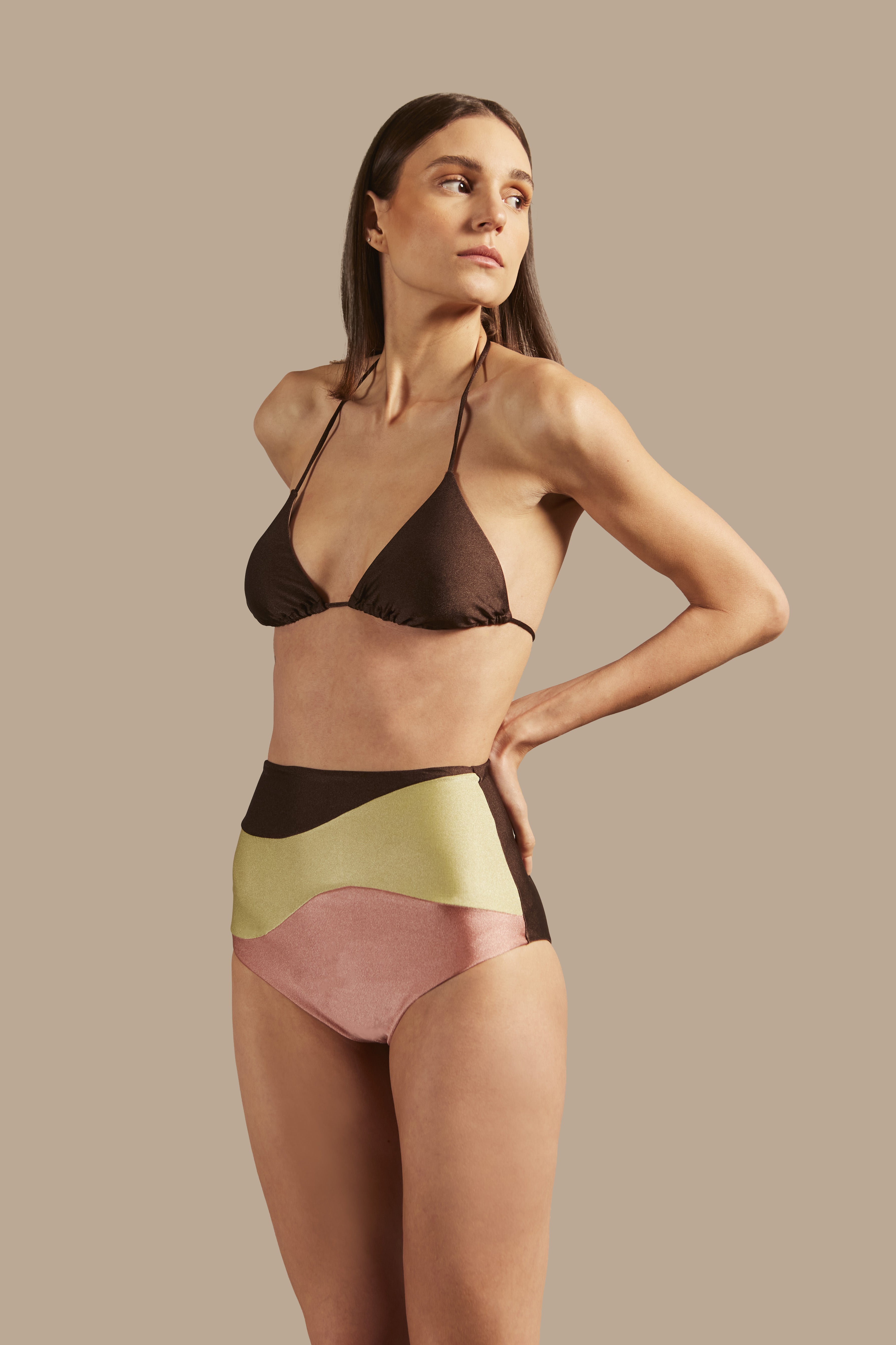 Model wearing the Giardino High-Waisted Bikini Front showcasing its Coffee/Green/Pink color on 85% Polyamide 15% Elastane fabric.