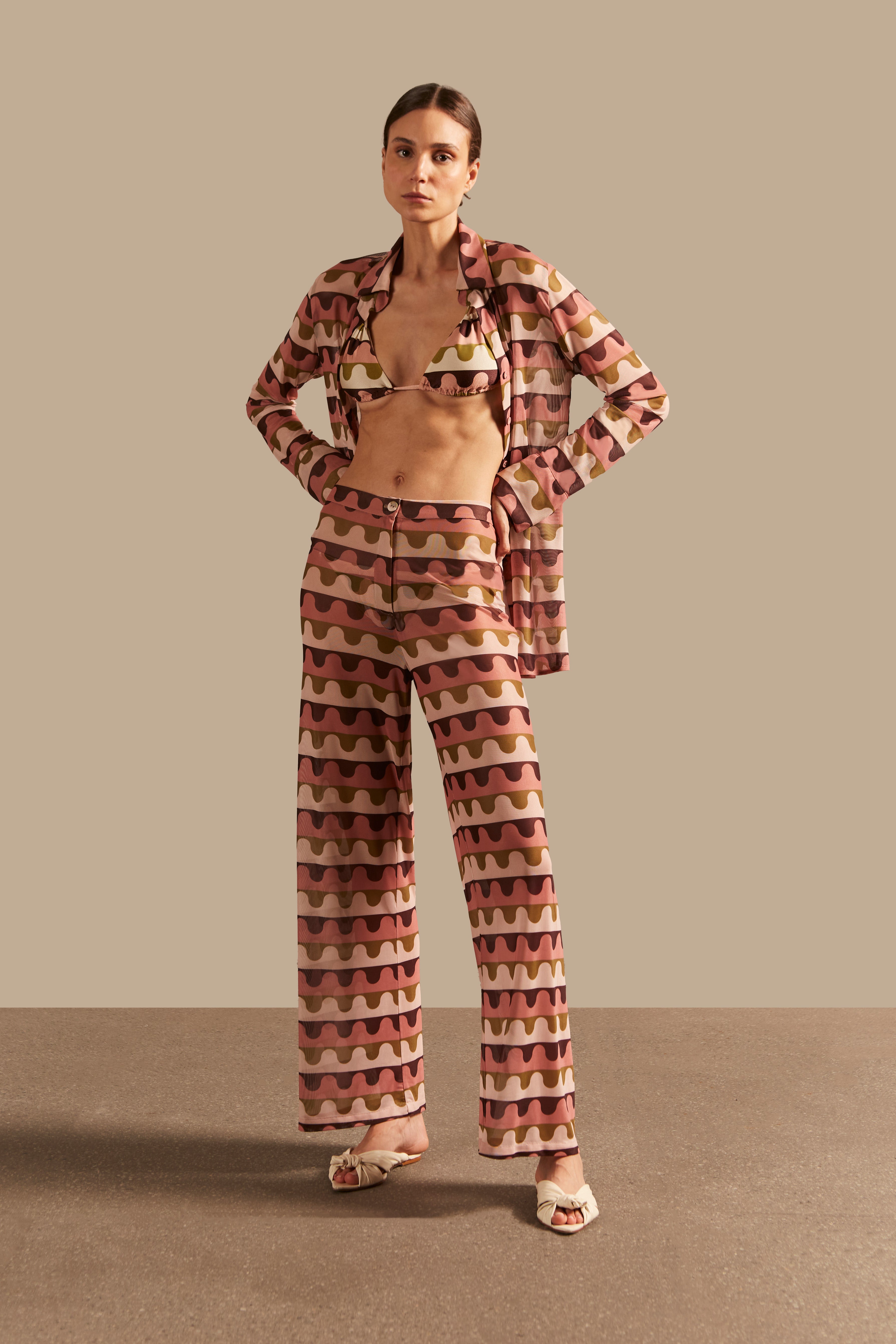 Model wearing the Giardino Straight Pants Shirt Front showcasing its Unique color on 96% Polyester 4% Elastane fabric, styled for an resort look.