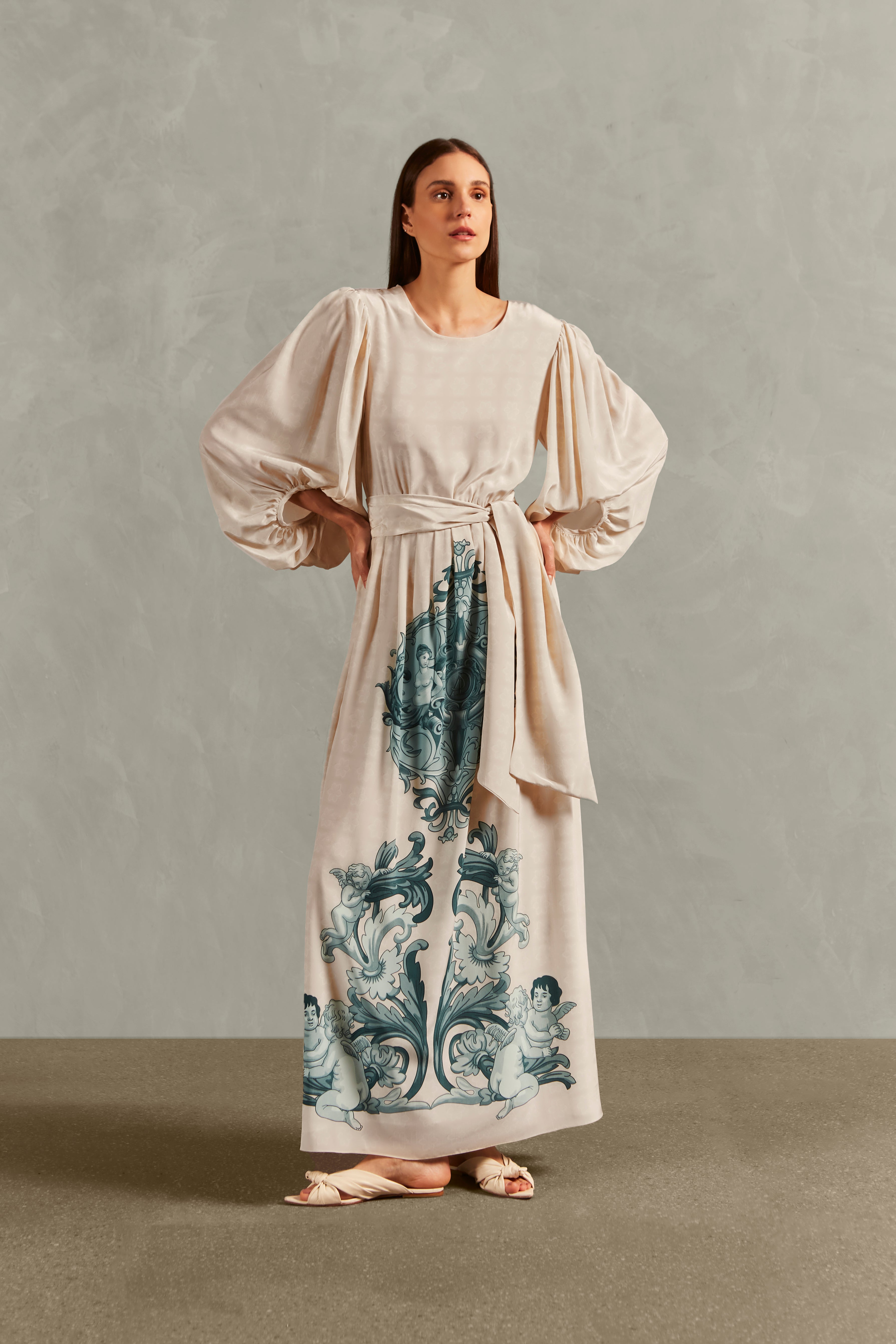 Model wearing the Hera Puff-Sleeved Long Dress Front showcasing its Off White color on 100% Silk fabric.