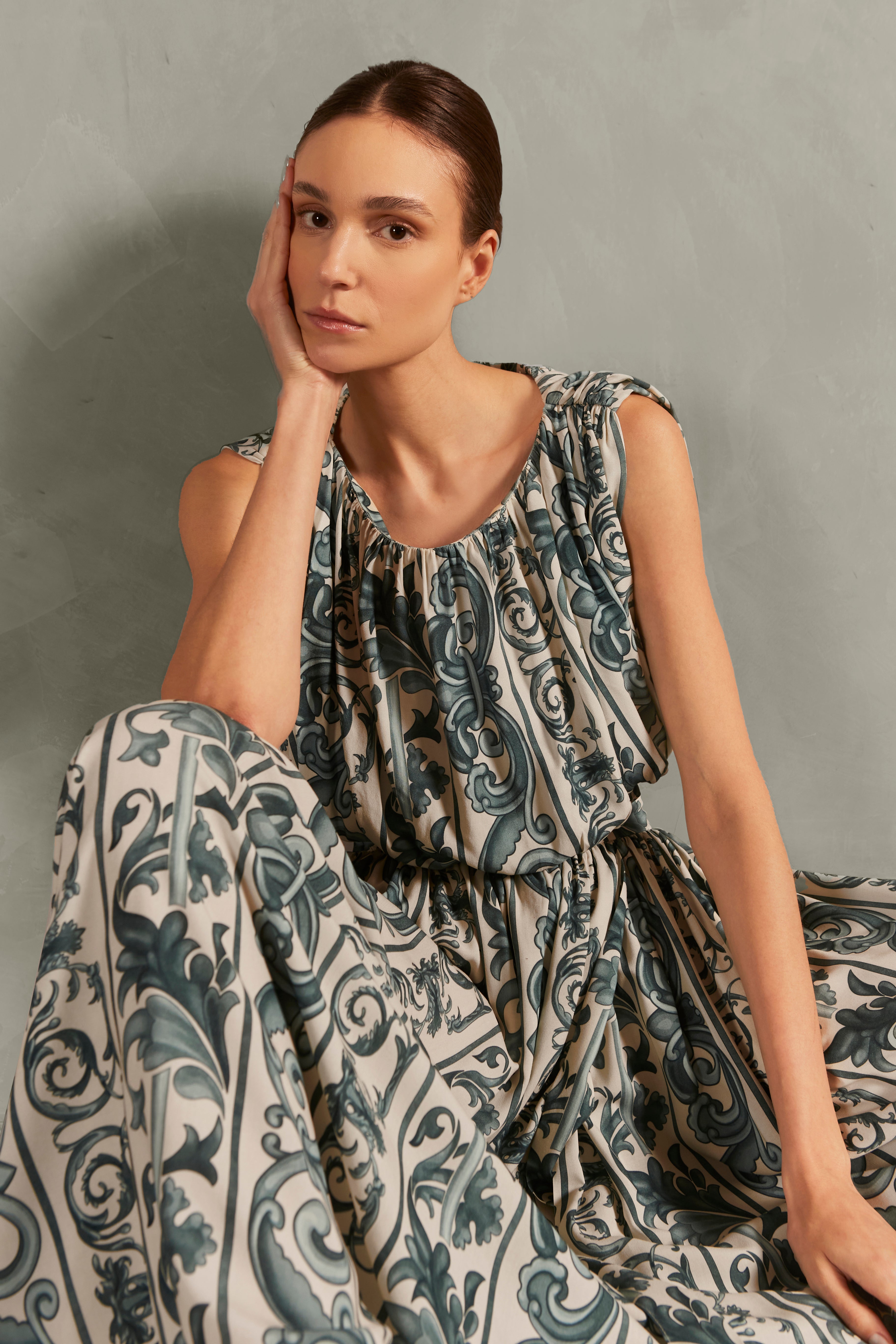 Model wearing the Hera Side-Slit Long Skirt Detail showcasing its BLUE color on 100% Viscose fabric.