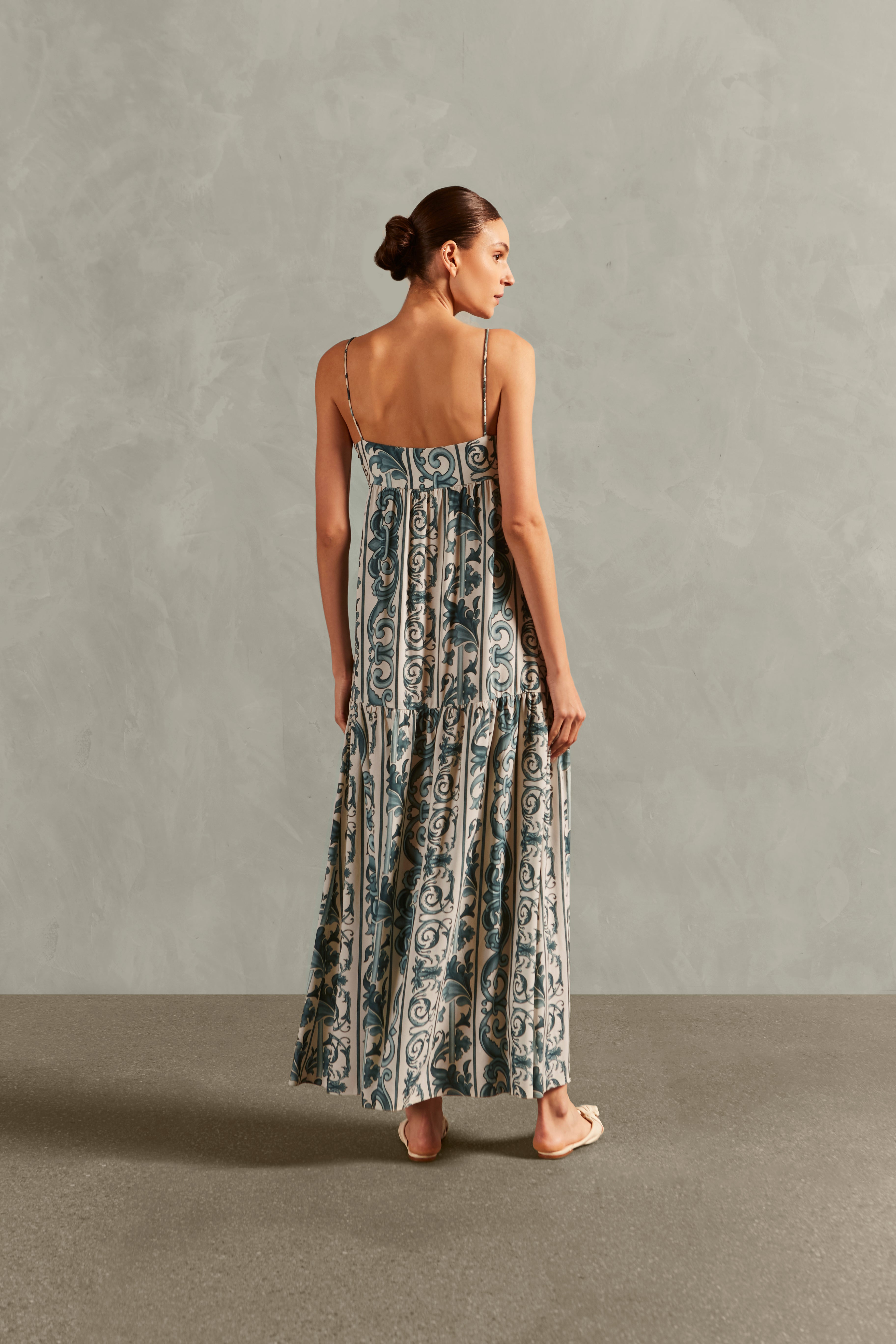 Model wearing the Hera Straps Long Dress Back showcasing its BLUE color on 100% Viscose fabric.