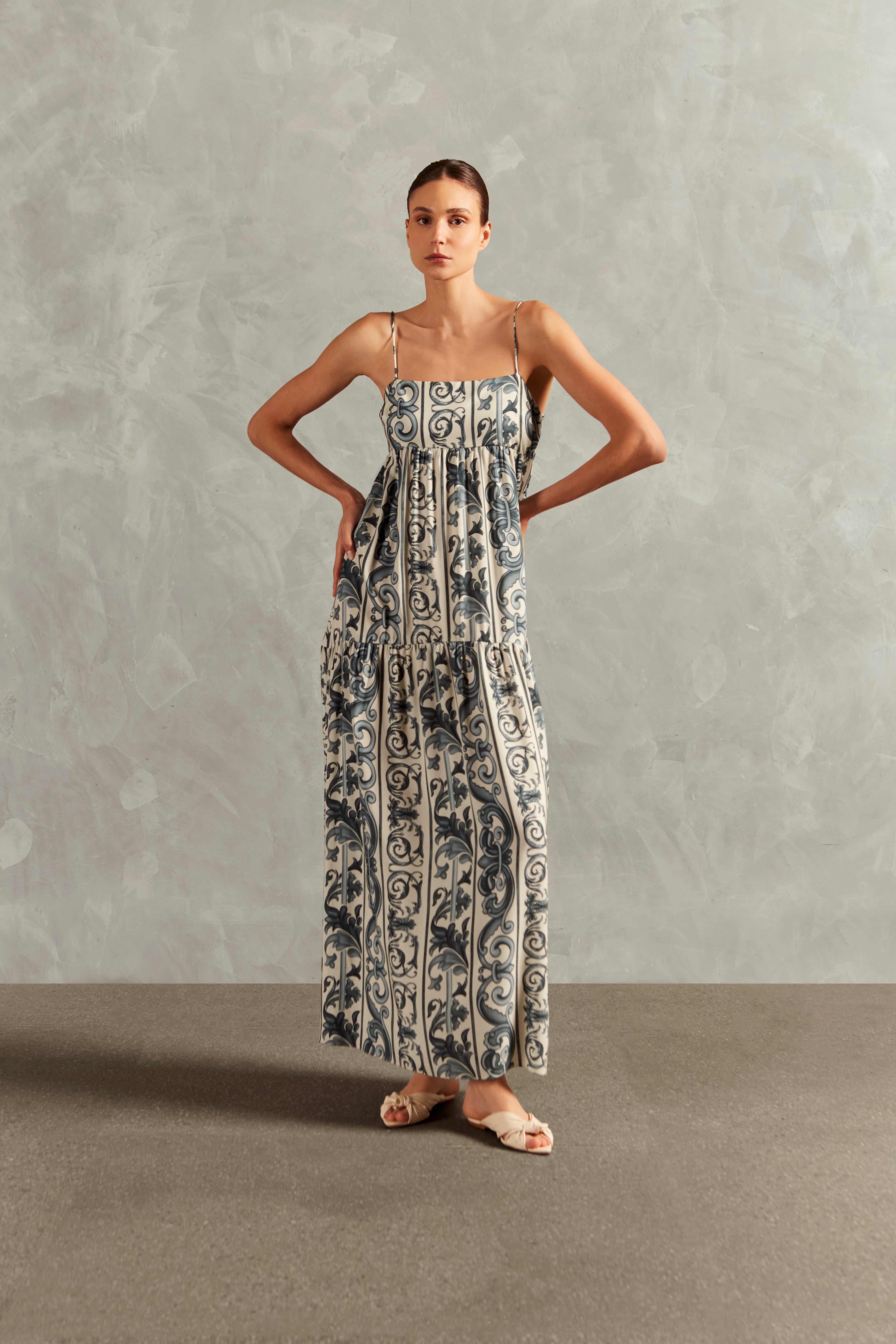 Model wearing the Hera Straps Long Dress Front showcasing its BLUE color on 100% Viscose fabric.