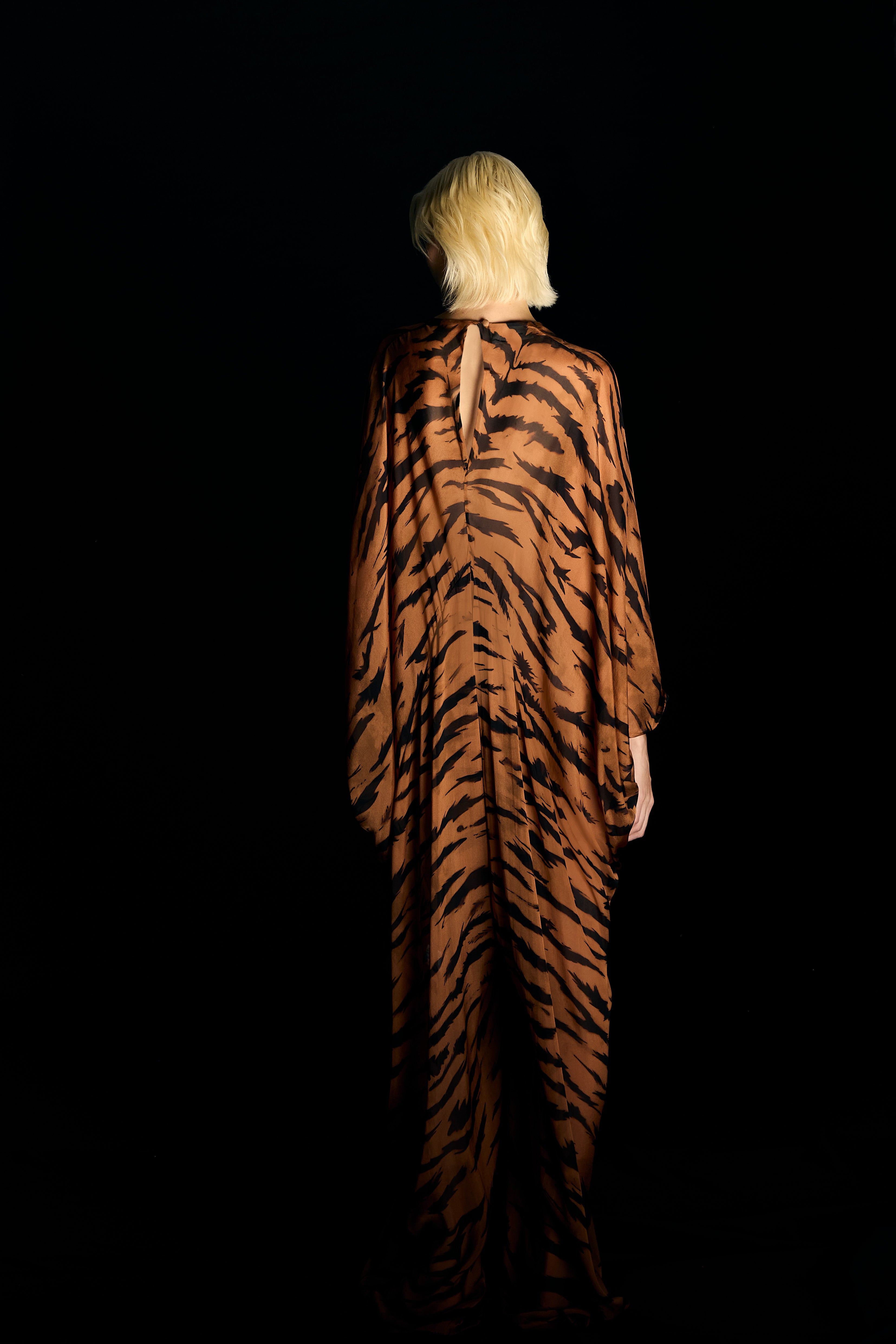 Model wearing the Jampsuit back from the Adriana Degreas and Sabine Getty collab with 100% Silk styled for a casual look.