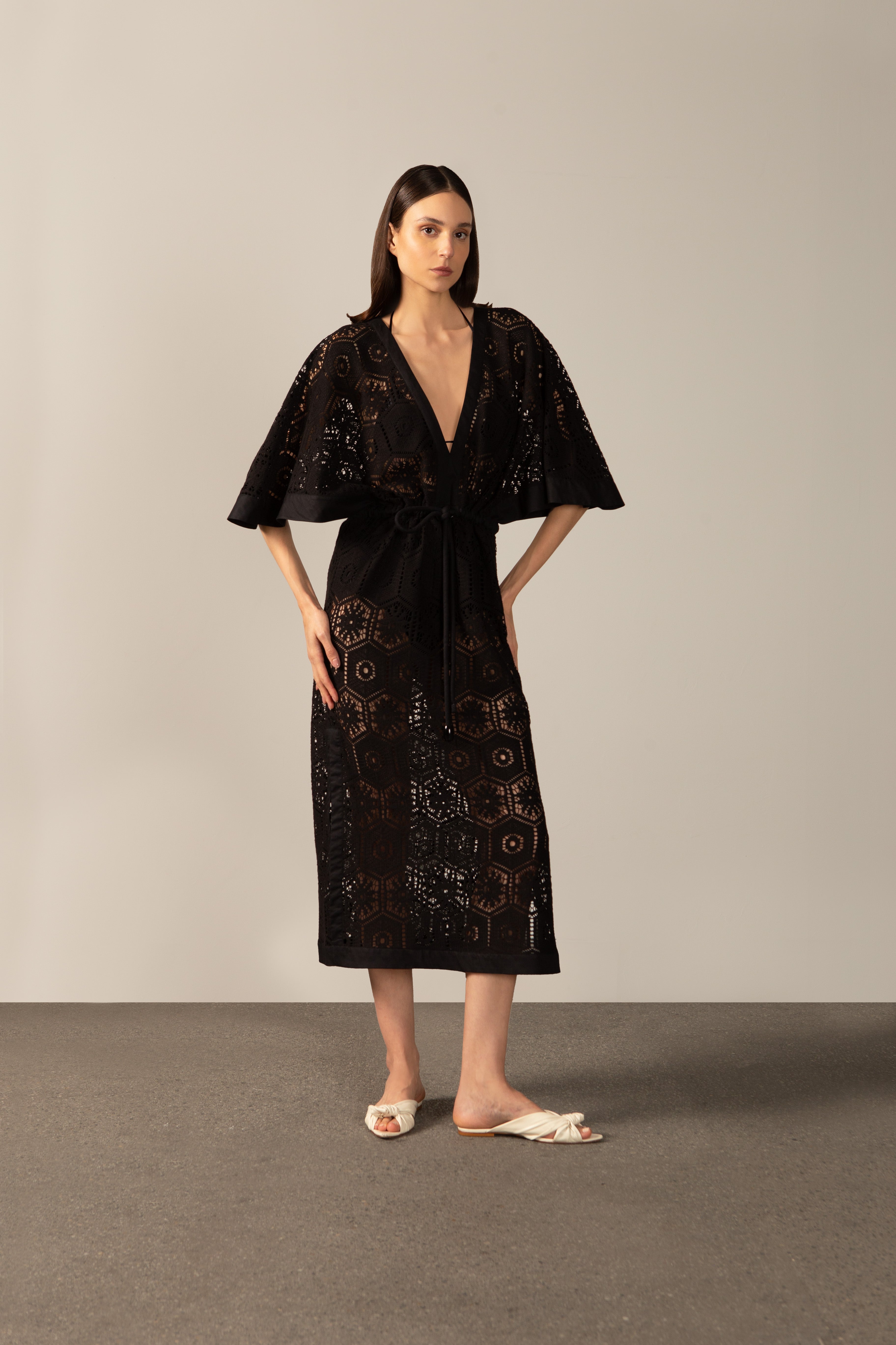 Model wearing the Lace V-Neck Lace Long Dress Front showcasing its Black color on 80% Polyester 20% Cotton fabric.