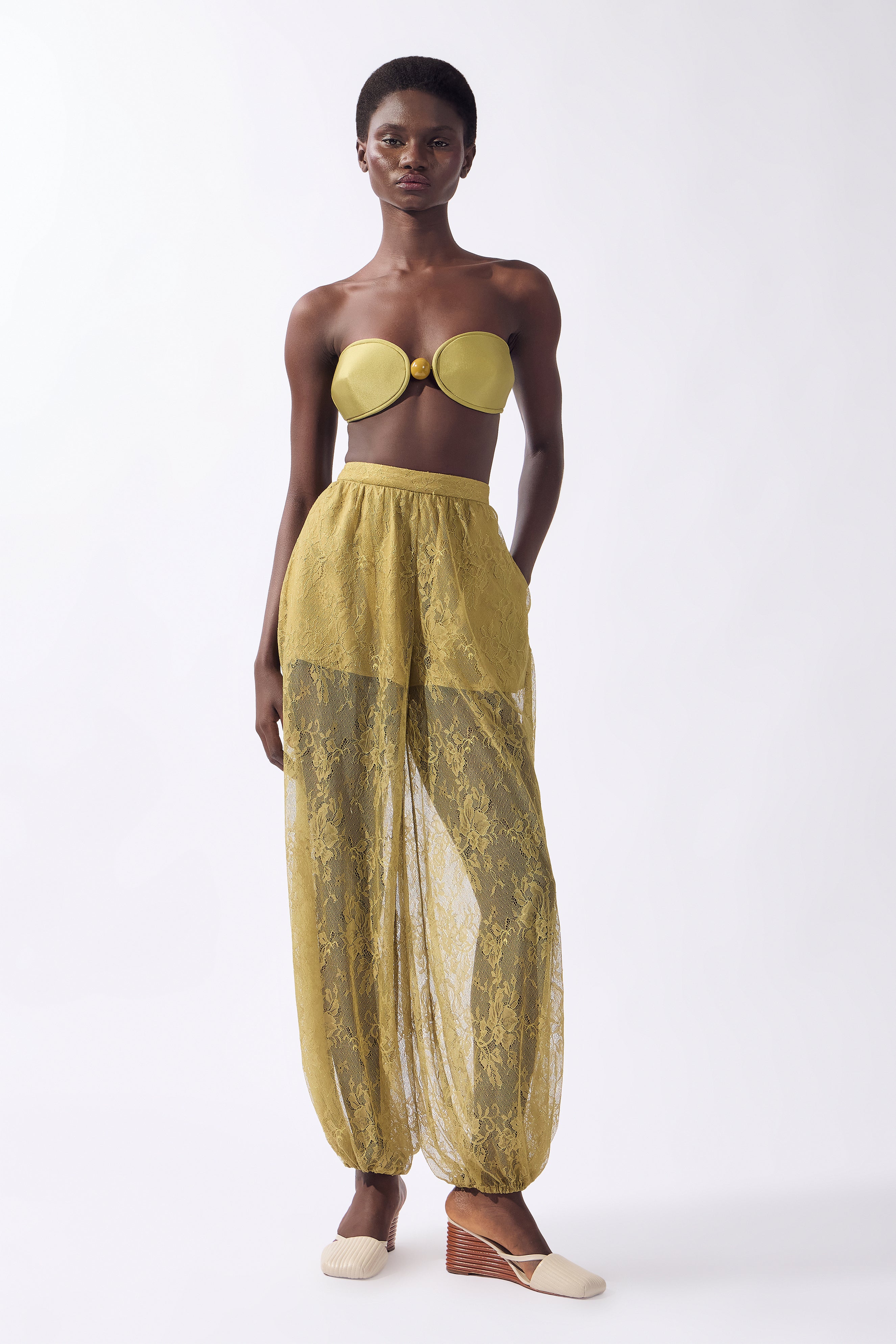 Model wearing the Lace Bubble Pants look, color pistachio, made from 100% polyamide, styled for a resort look