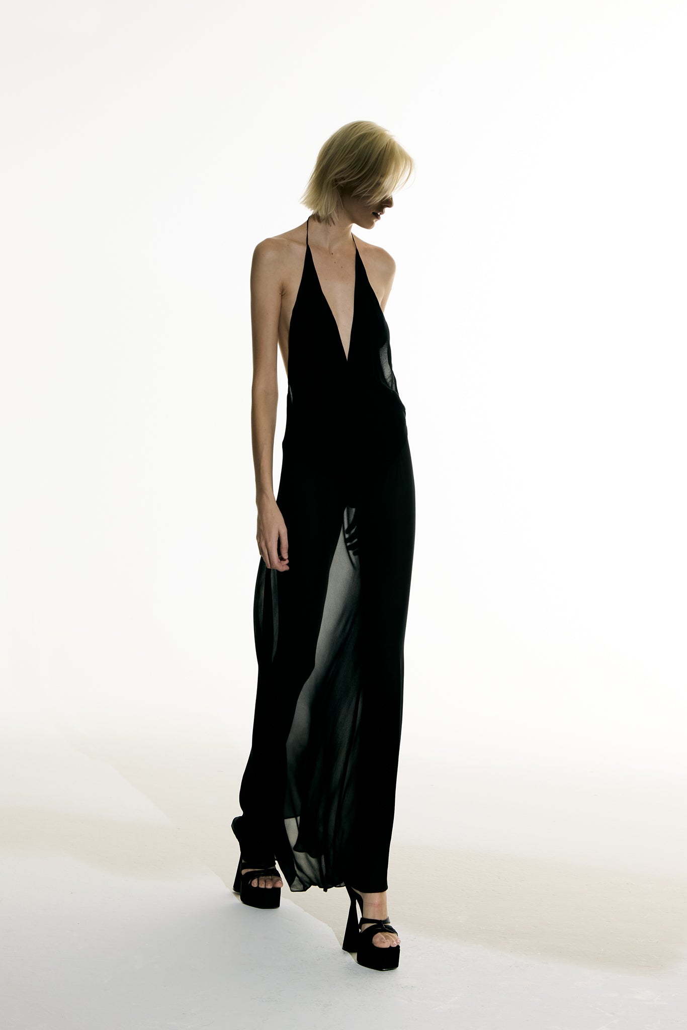 Model wearing the Open Back Slip Dress front from the Adriana Degreas and Sabine Getty collab with 100% Silk styled for a date night look.