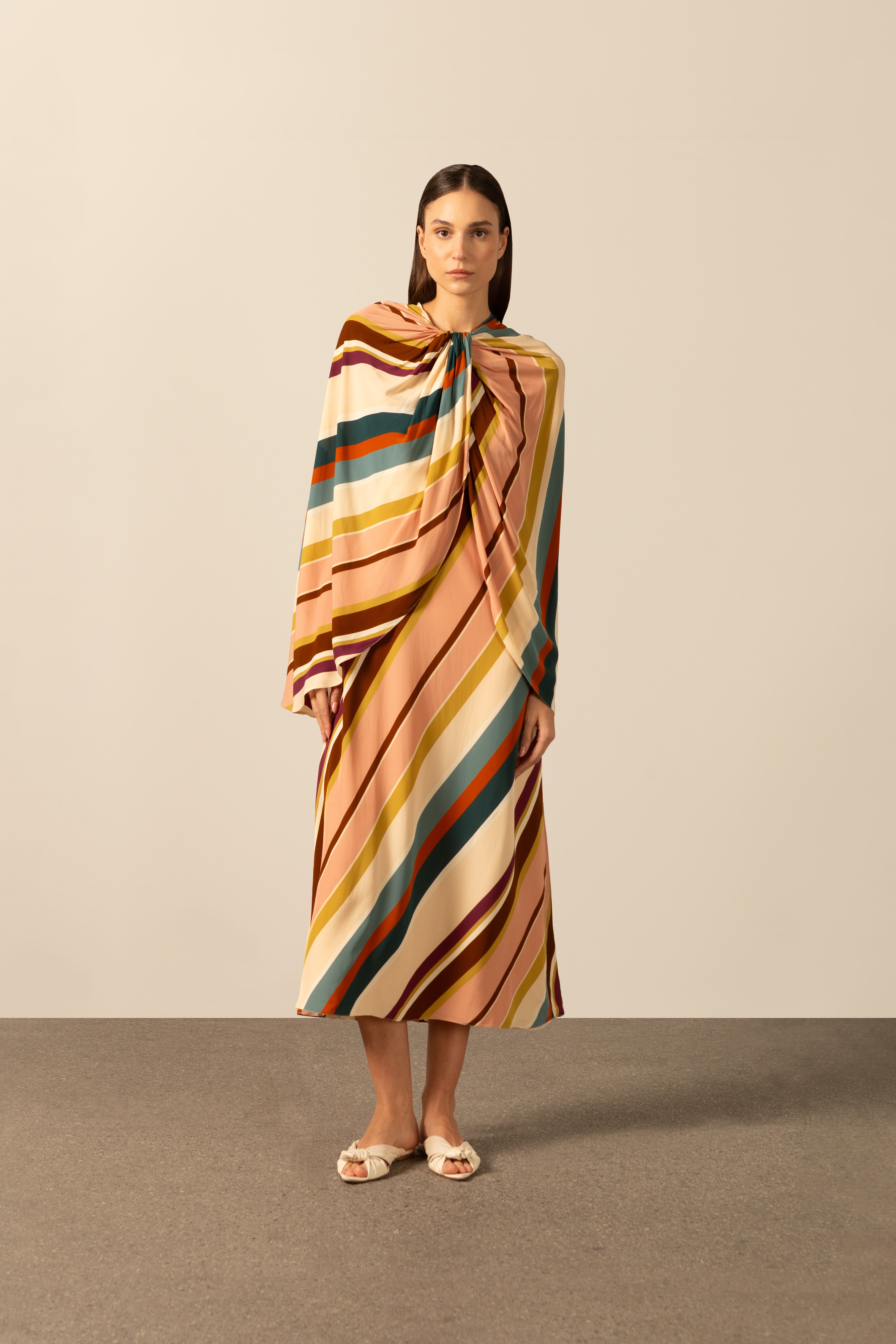 Model wearing the Organic Stripes Midi Dress unique color front from the HS25 with 100% Viscose styled for a lunch look.
