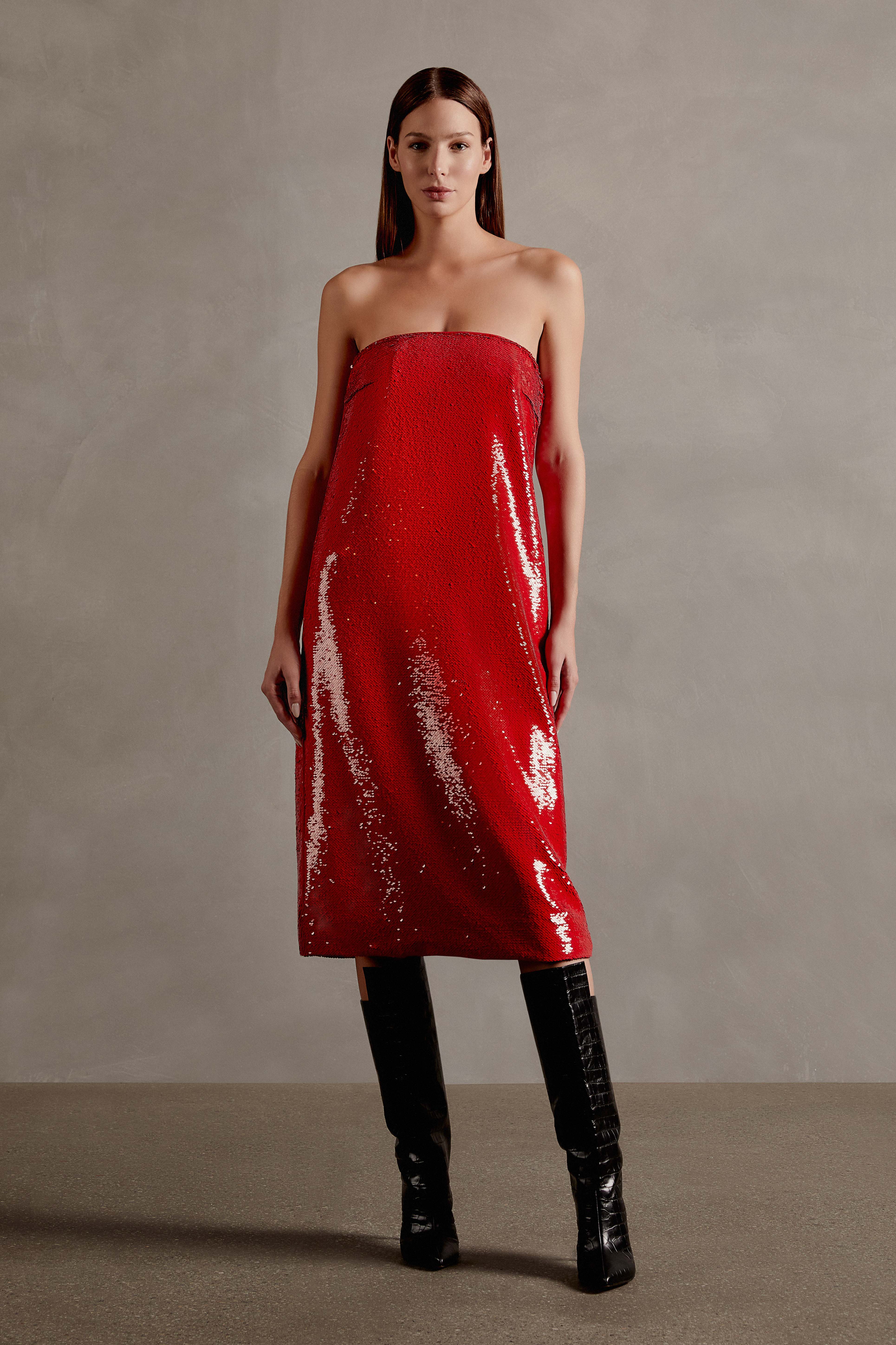 Model wearing the Sequins Midi Dress Front showcasing its Red print on 98% Polyester 2% Elastane fabric, styled for an evening look.