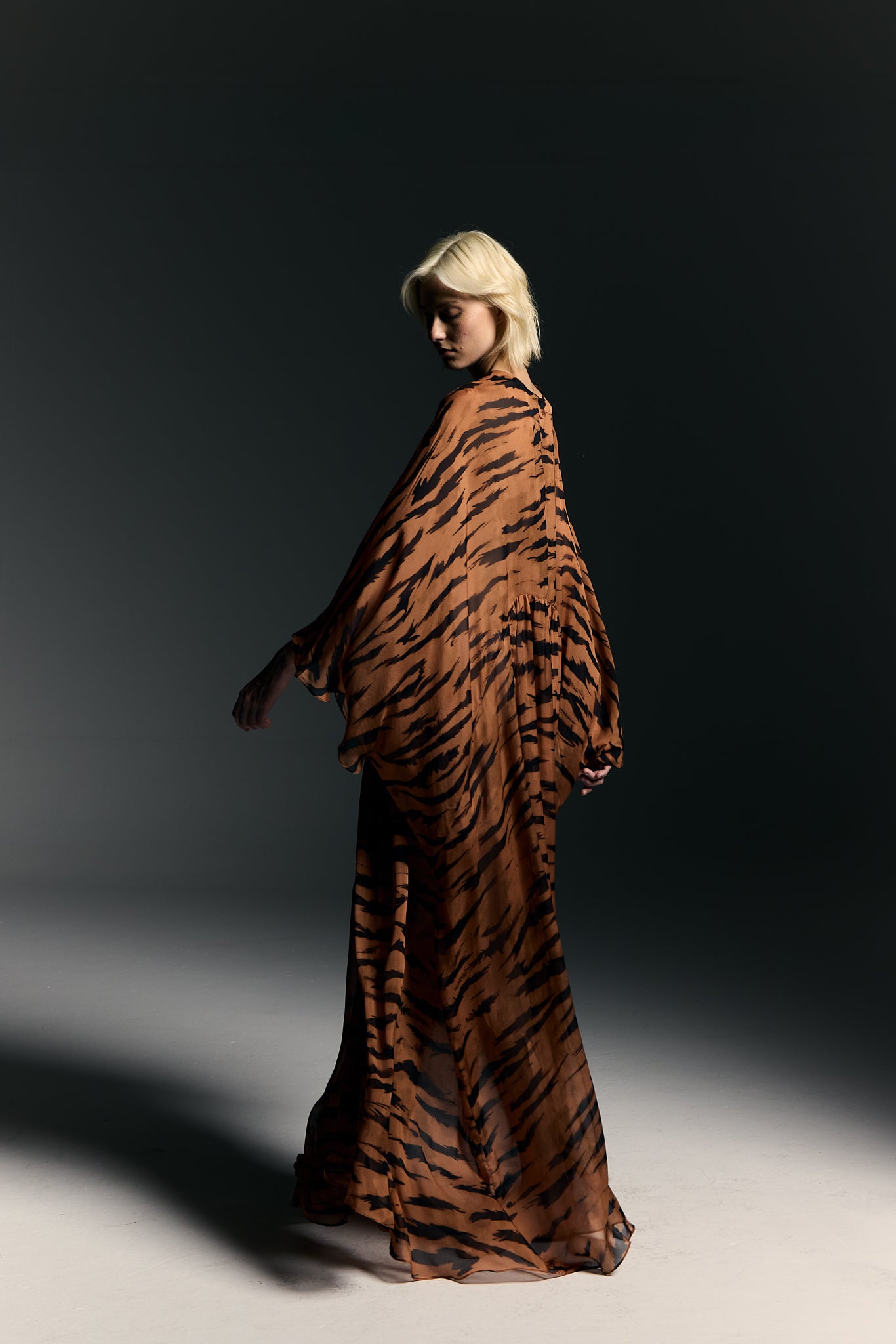 Model wearing the Silk Maxi Kaftan concept from the Adriana Degreas and Sabine Getty collab with 100% Silk styled for an evening look.