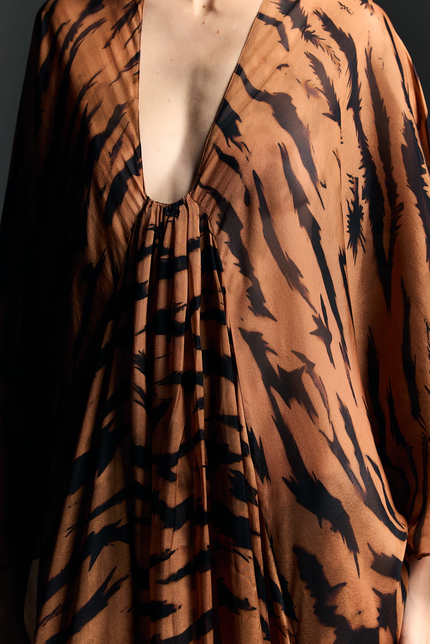 Model wearing the Silk Maxi Kaftan detail from the Adriana Degreas and Sabine Getty collab with 100% Silk styled for an evening look.