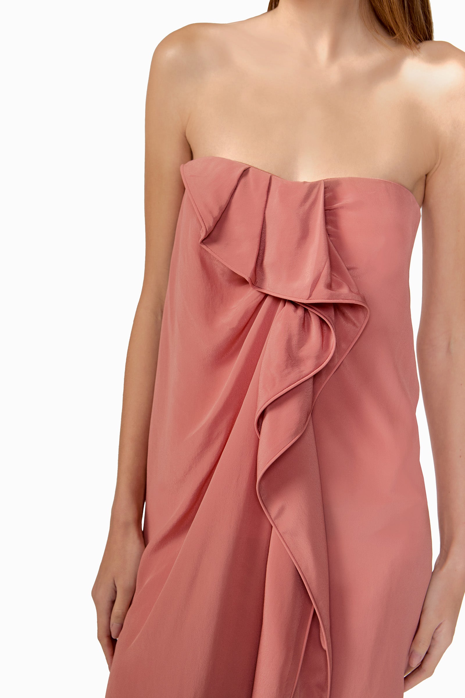 Model wearing the Solid Ruffled Strapless Maxi Dress detail showcasing its vintage rose color on 100% Viscose fabric, styled for a resort look.