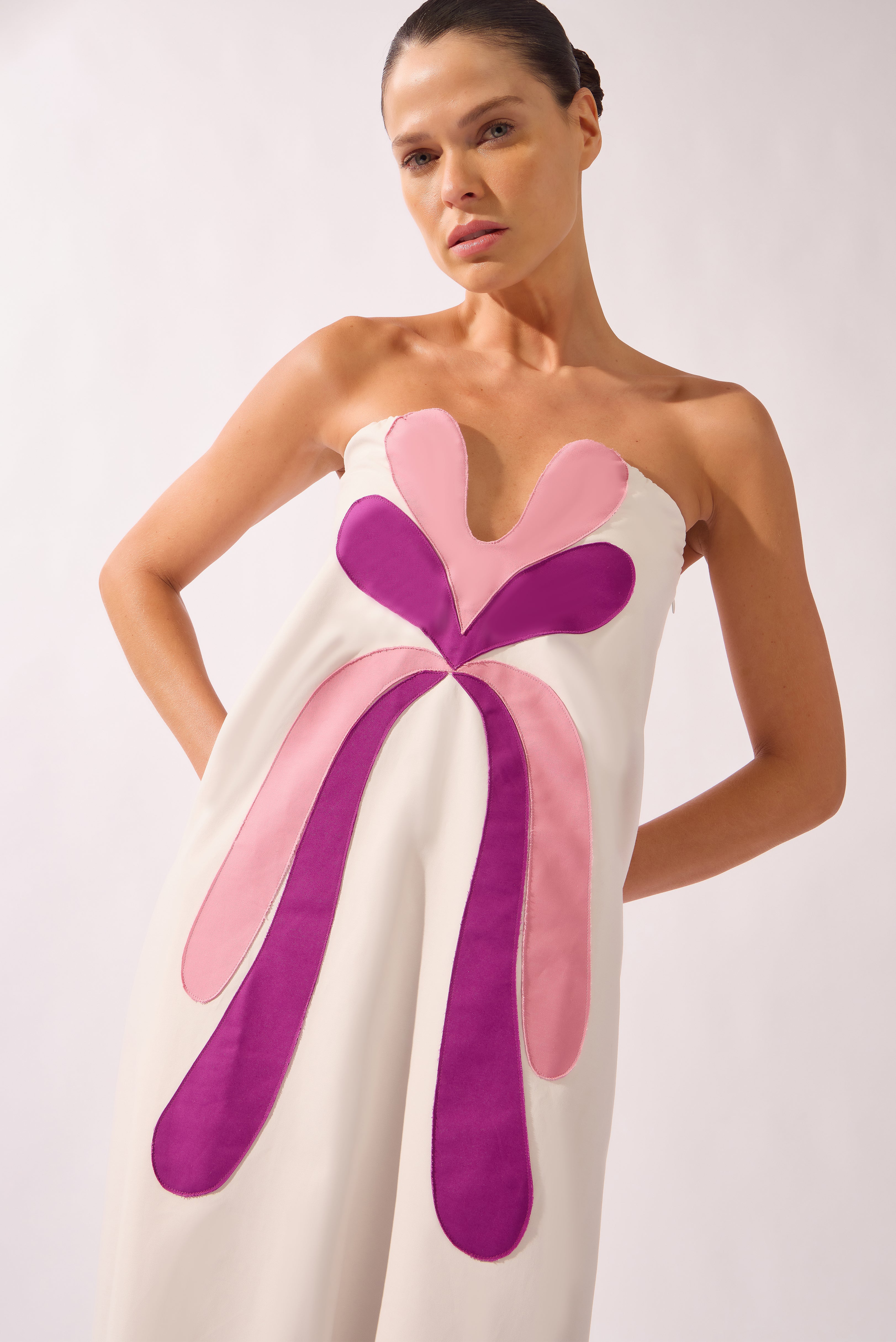 Model wearing the Structured Maxi Dress detail color off white, made from 97% cotton 03% elastane, styled for a dinner look