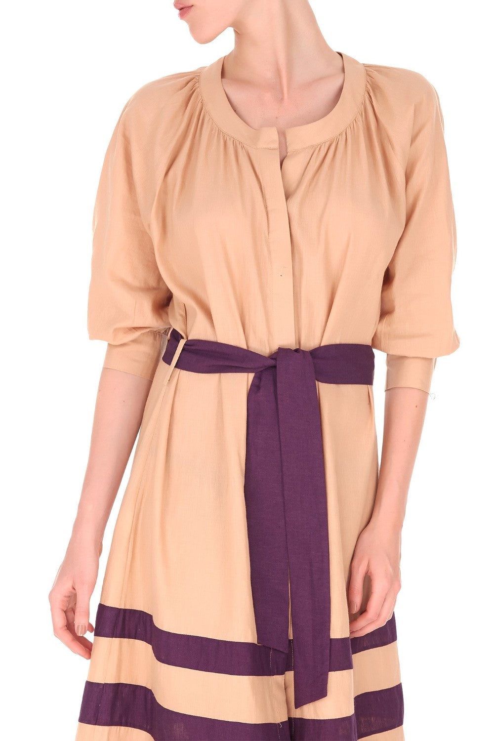 Crafted from linen, this dress come with a matching belt or can be worn unbuttoned as part of a layered look