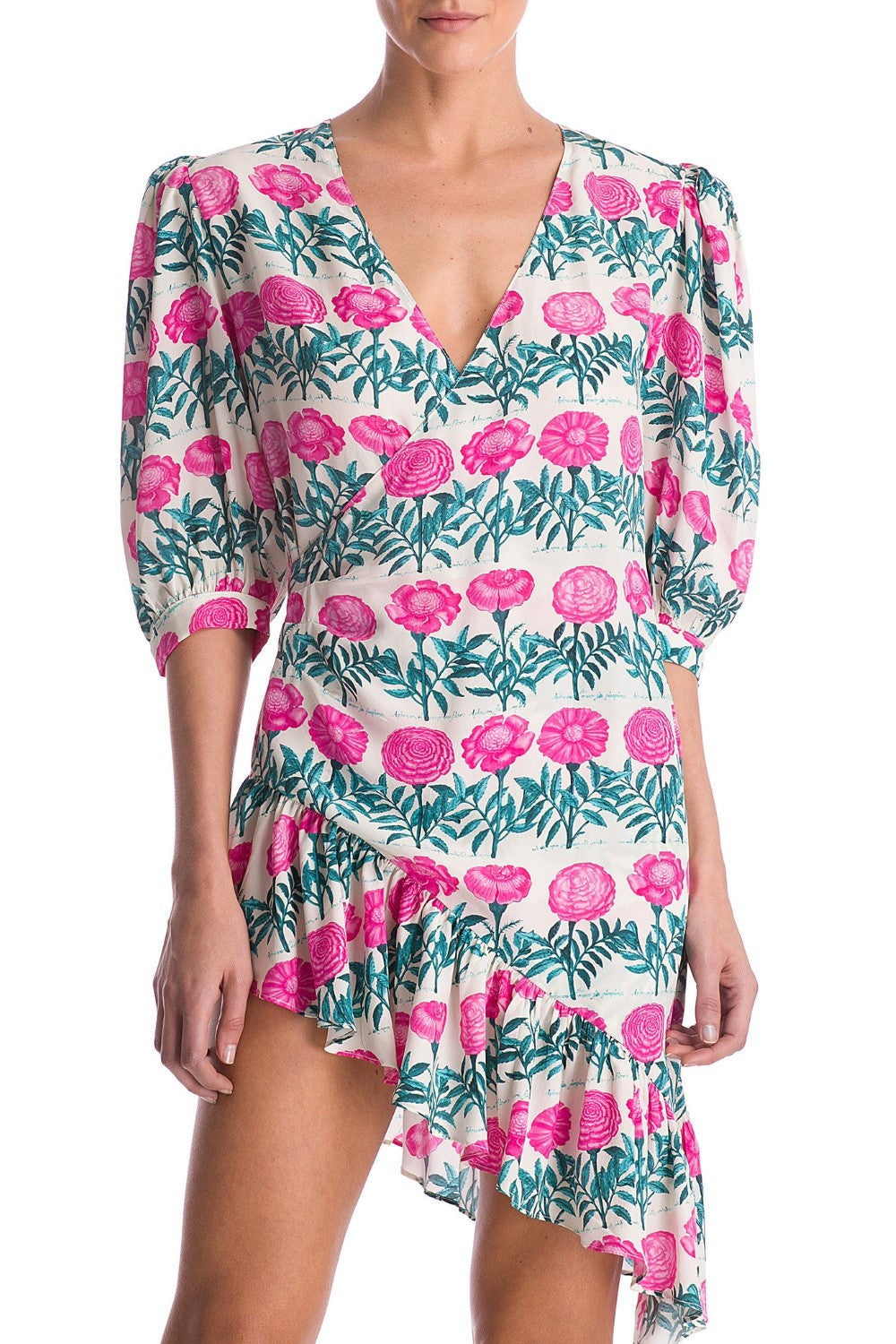 Crafted in silk, this cocktail dress has puffed sleeves and falls perfectly to an asymmetric hem