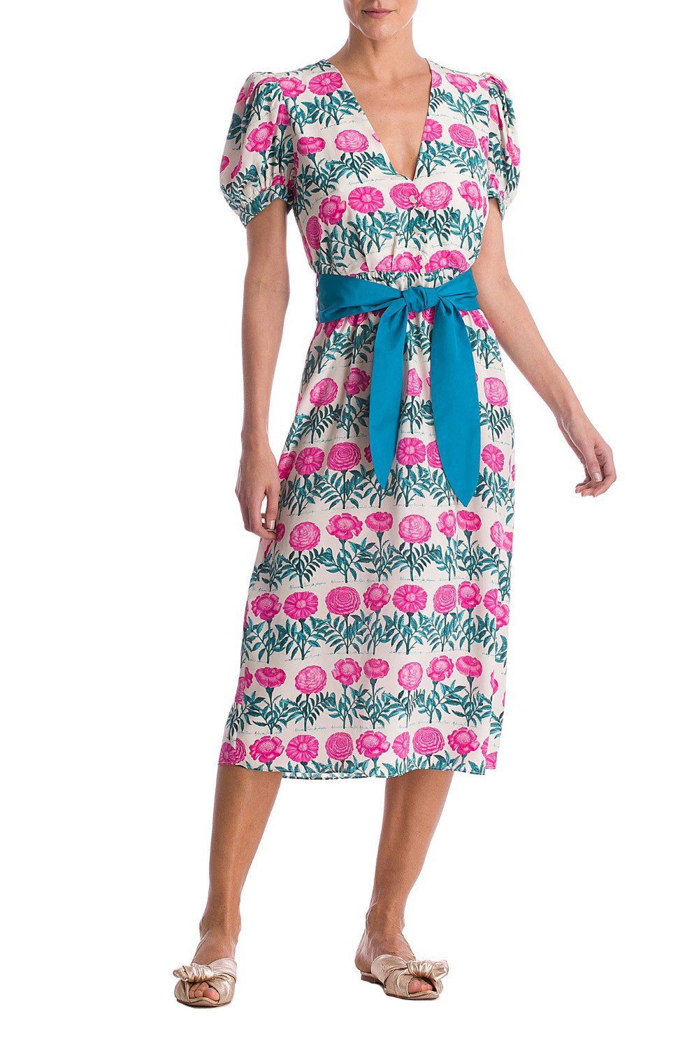 This dress is cut from fluid silk and has a self-tie belt, making it a effortless chic piece