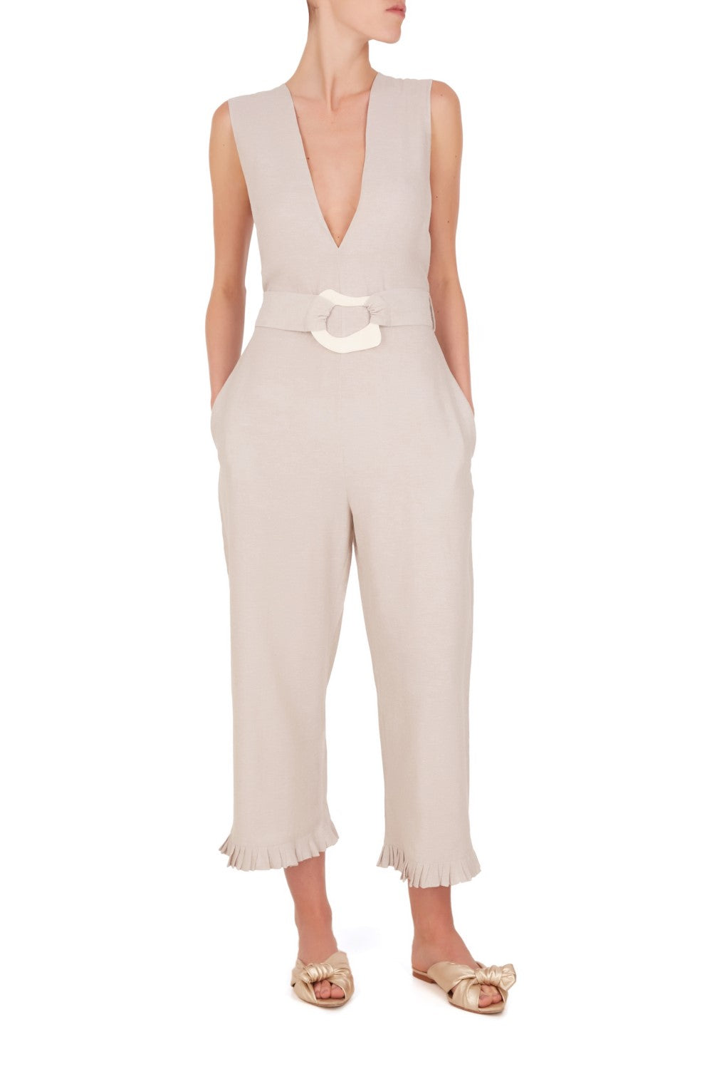 The chic lightweight linen-blend jumpsuit that comes with the matching belt with resin buckle detail has inspirations from vintage references from 1970’s style