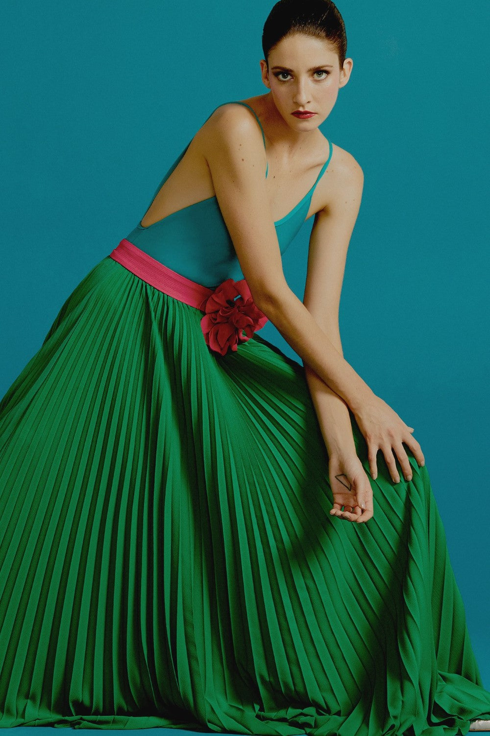 This Le Fleur pleated maxi skirt is perfect for vacations. Slip it on over the swimsuits in solid colors like purple for a sophisticated poolside look
