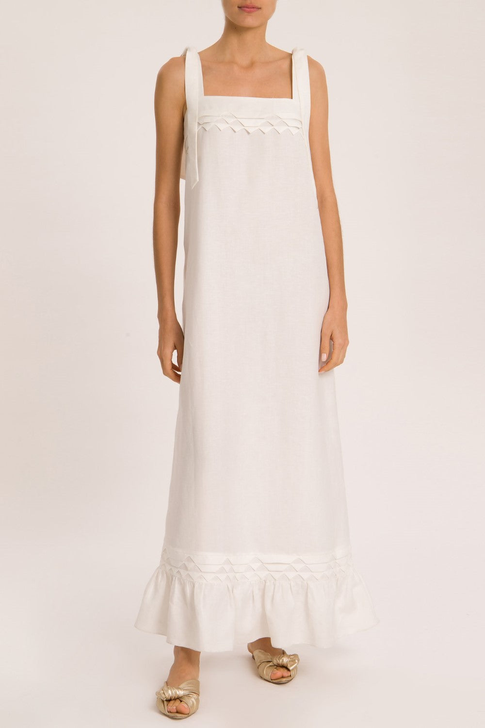 Think about effortless chic pieces to wear day and night like this long dress  with handmade details