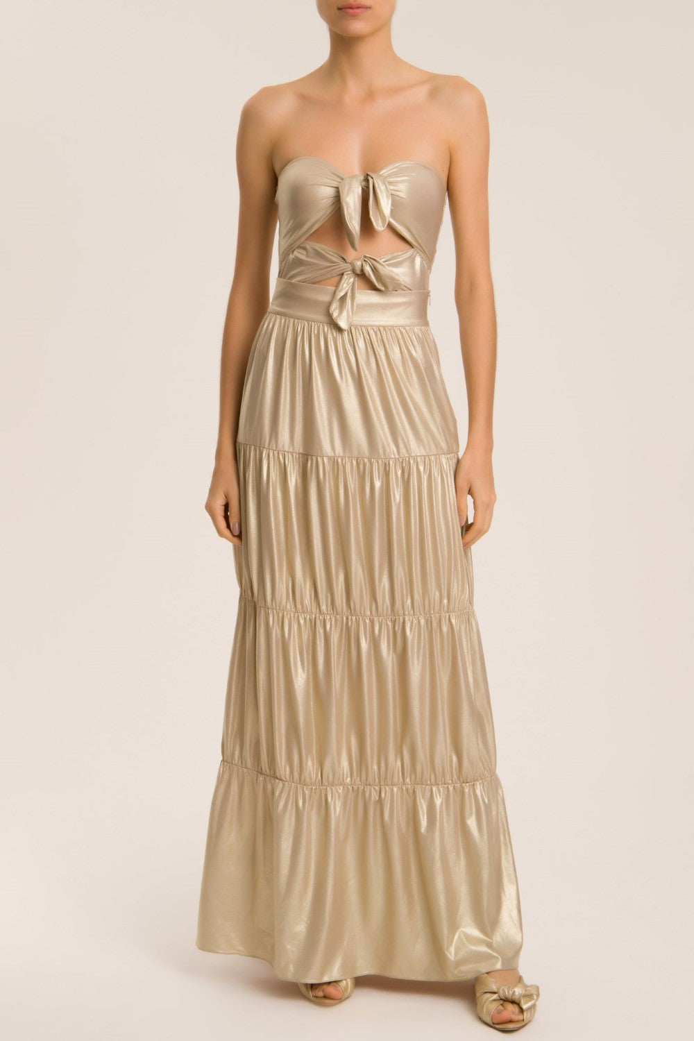 This long skirt is made of lightweight metallic fabric and can be worn in so many ways