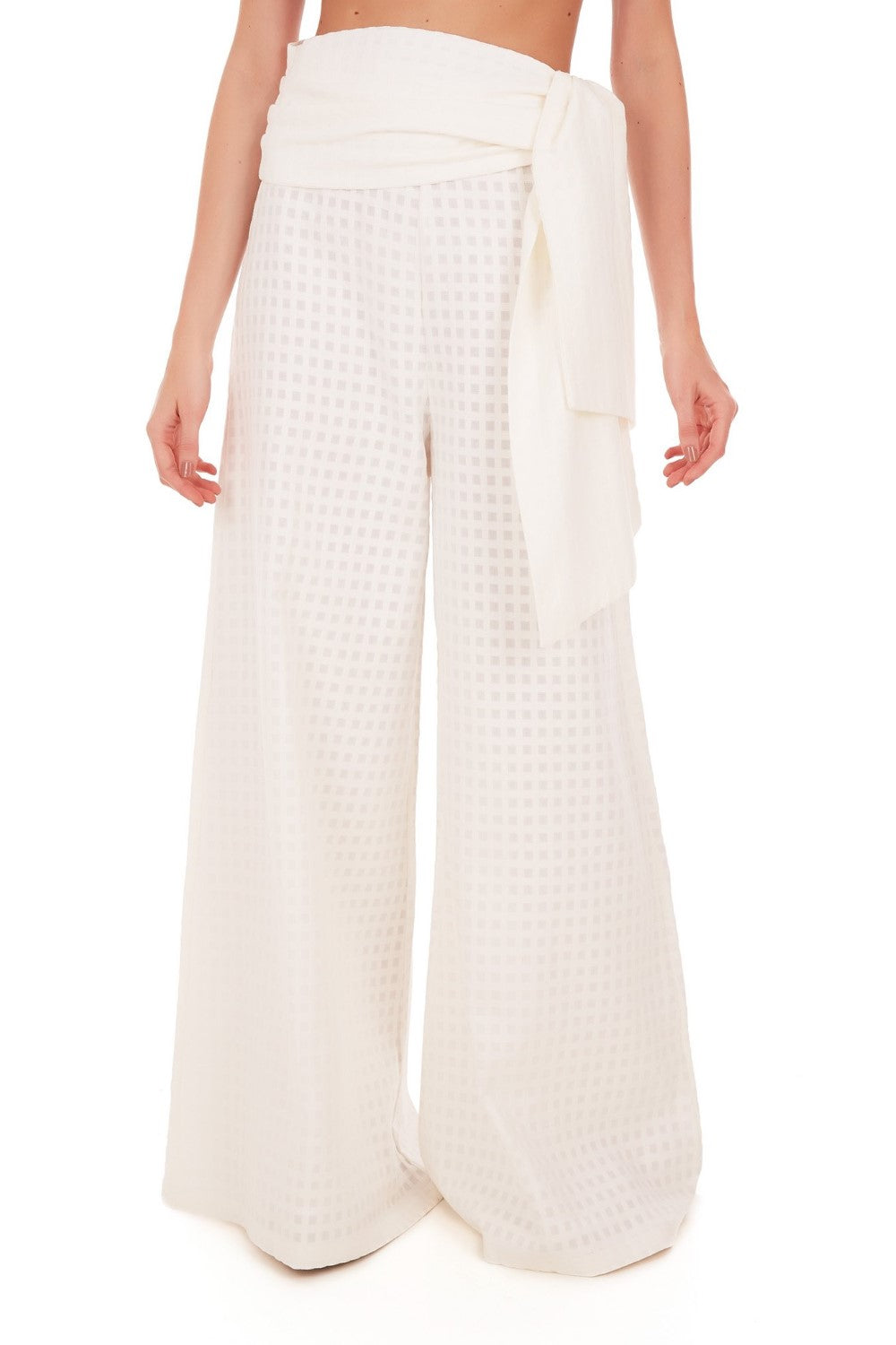 These cotton pants have an extra-long wide leg and can be worn on vacation with a matching shirt and slides for a contemporary outfit