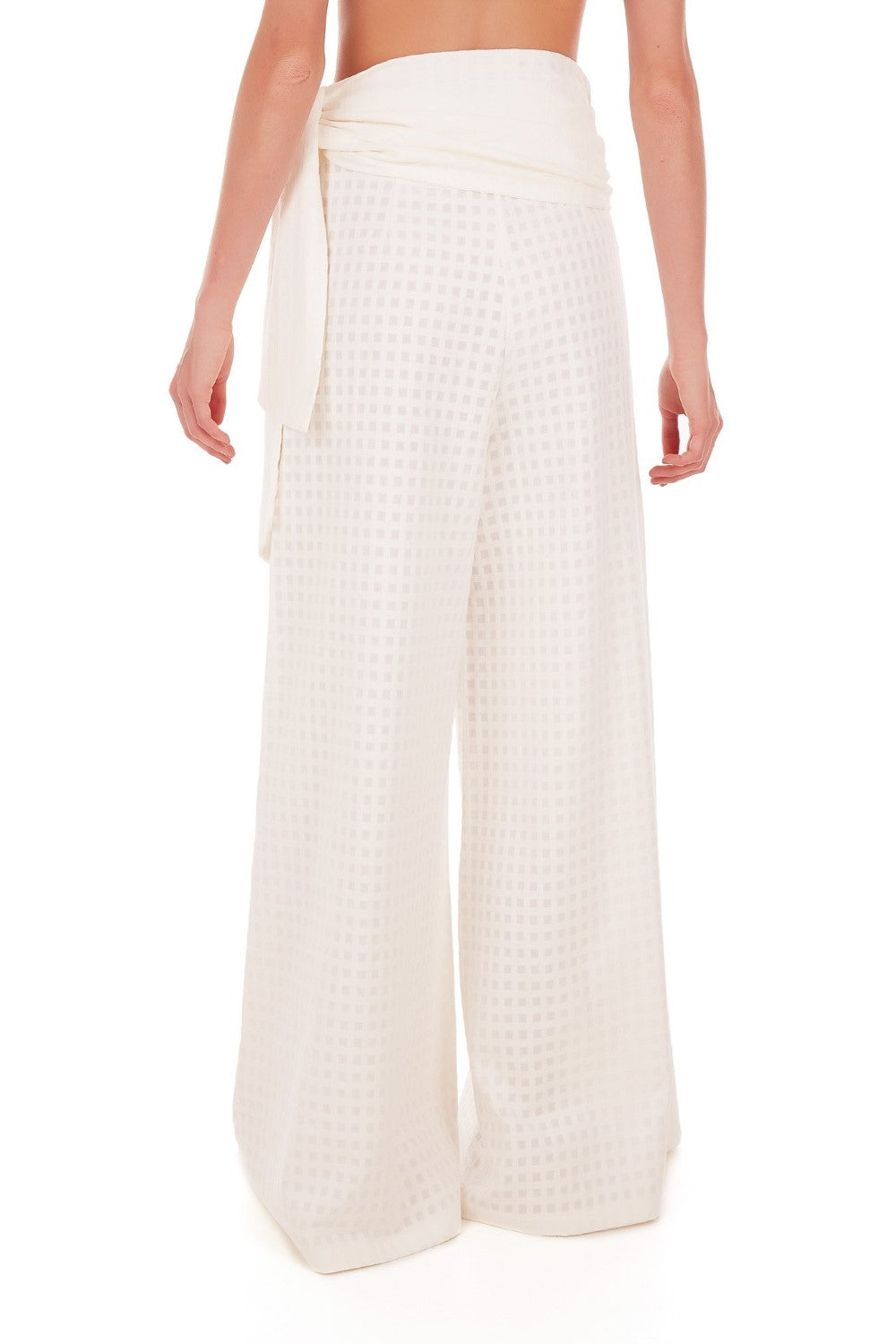 These cotton pants have an extra-long wide leg and can be worn on vacation with a matching shirt and slides for a contemporary outfit