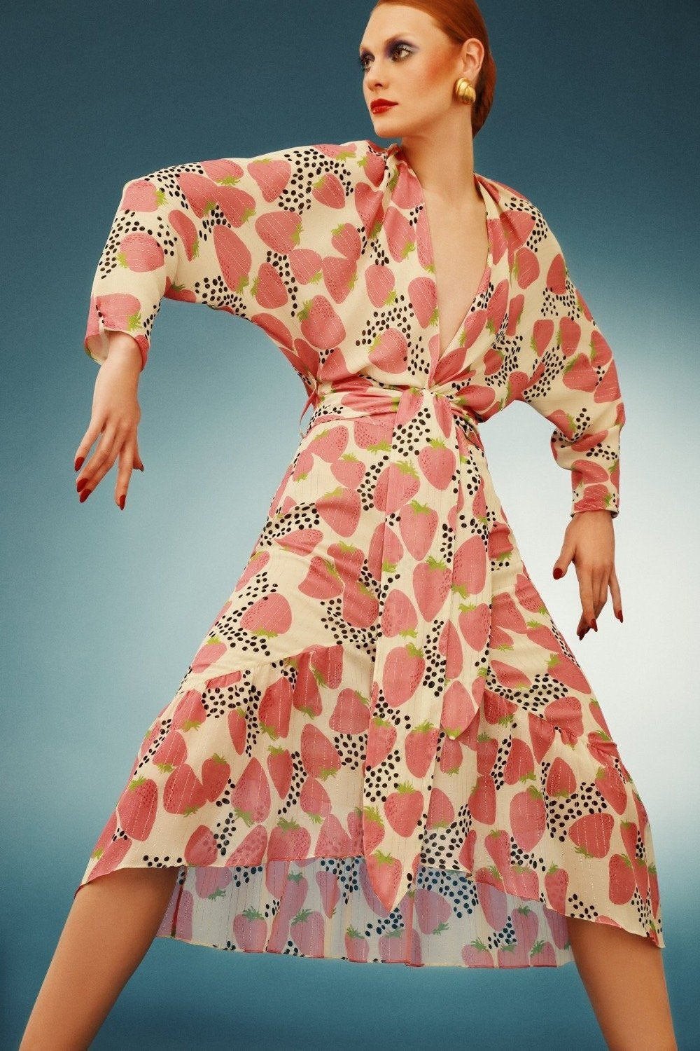 An effortless chic piece to wear on your next special occasion, this strawberry midi dress is the perfect choice