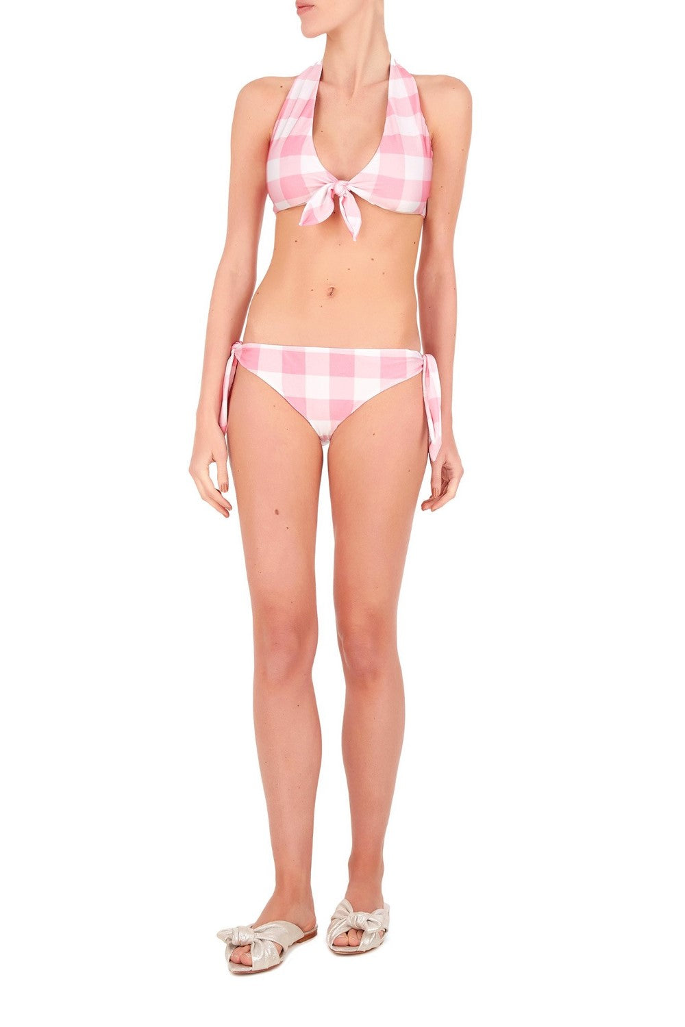 This halterneck retro style bikini is inspired by pieces discovered in vintage stores and markets the designer visits. It´s made in Brazil with stretch fabric- the top and the briefs are self-tie for your perfect fit. Wear yours with matching robe for a modern outfit