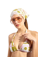 Model wearing the Balearic Triangle Bikini detail color unique with 85% Polyamide 15% Elastane, styled for a beachwear look