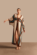 Model wearing the Bold Stripes Long Robe Front showcasing its Unique print on 100% Viscose fabric, styled for an afternoon look.