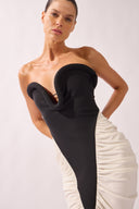 Model wearing the Bold Noir Midi Dress detail color black, made from 76.3% polyamide 23.7% elastane, styled for a dinner look