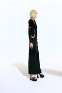 Model wearing the  Cut-Out Plunge Maxi Dress concept from the Adriana Degreas and Sabine Getty collab with 75% Polyamide 25% Elastane styled for a dinner look.