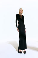 Model wearing the  Cut-Out Plunge Maxi Dress front from the Adriana Degreas and Sabine Getty collab with 75% Polyamide 25% Elastane styled for a dinner look.