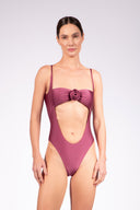 Model wearing the Flower Appliqué Swimsuit front, made from 85% polyamide 15% elastane, styled for a beachwear look