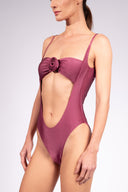 Model wearing the Flower Appliqué Swimsuit look, made from 85% polyamide 15% elastane, styled for a beachwear look