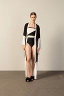 Model wearing the Geometric Long Robe black color styling from the HS25 with 100% viscose styled for a drinks at the boat look. 