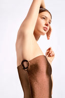 Model wearing the  Geometric Strapless Swimsuit cappuccino front from the HS25 with 85% Polyamide 15% Elastane styled for a beach look. 