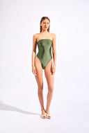 Model wearing the  Geometric Strapless Swimsuit croco green front from the HS25 with 85% Polyamide 15% Elastane styled for a beach look. 