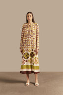 Model wearing the Giardino Long Tunic Front showcasing its Unique color on 100% Viscose  fabric, styled for an afternoon look.  
