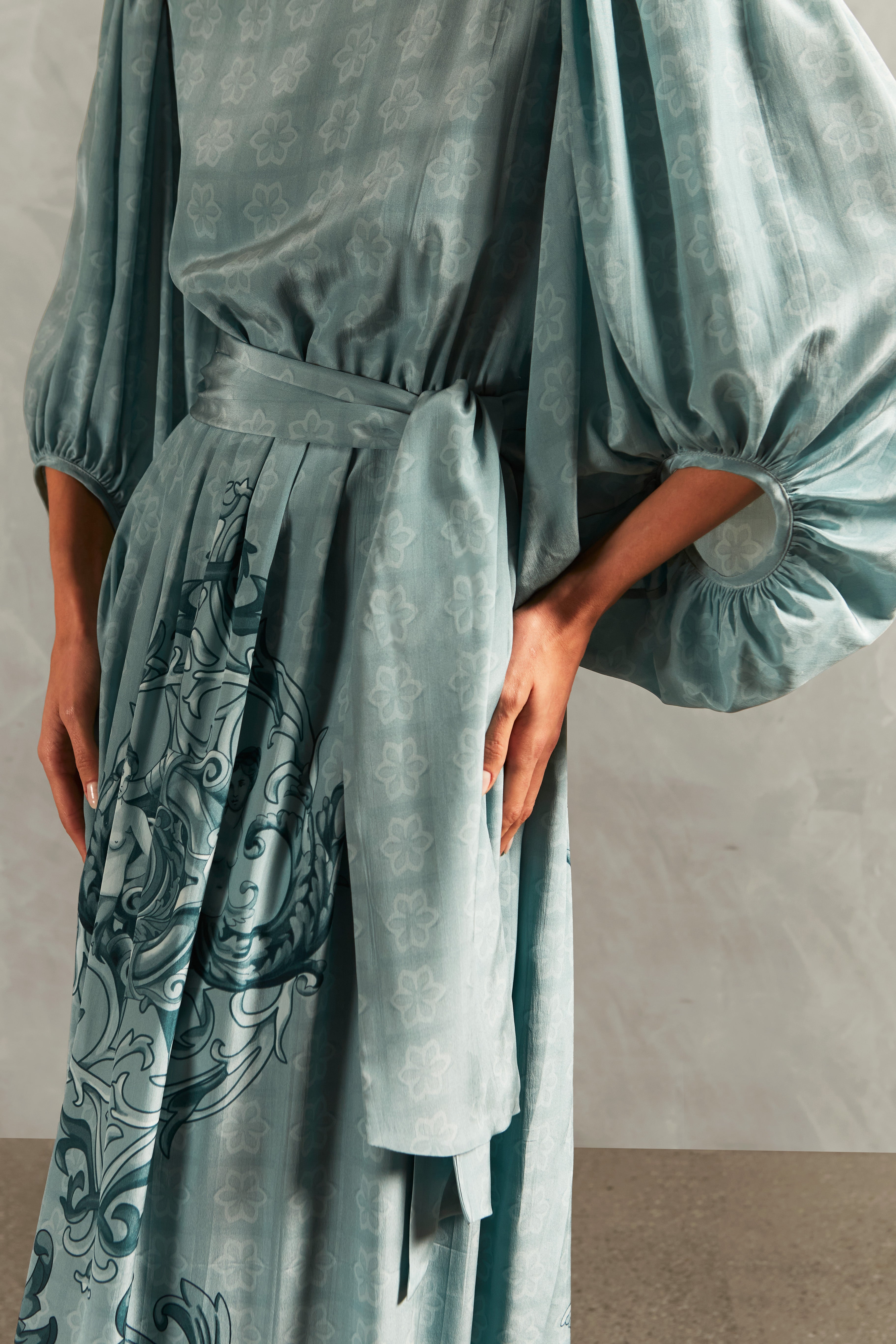 Model wearing the Hera Puff-Sleeved Long Dress Detail showcasing its Blue color on 100% Silk fabric.  