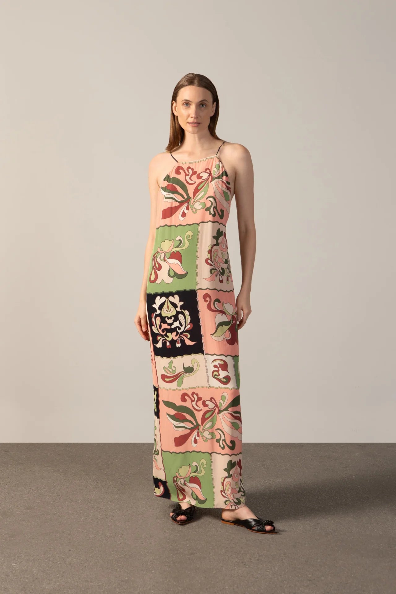 Model wearing the Inamorata Bare Back Maxi Dress front with 100% viscose fabric styled for a lunch look