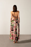 Model wearing the Inamorata Side-Slit Maxi Skirt back color pink made with 100% cotton, styled for resortwear look 