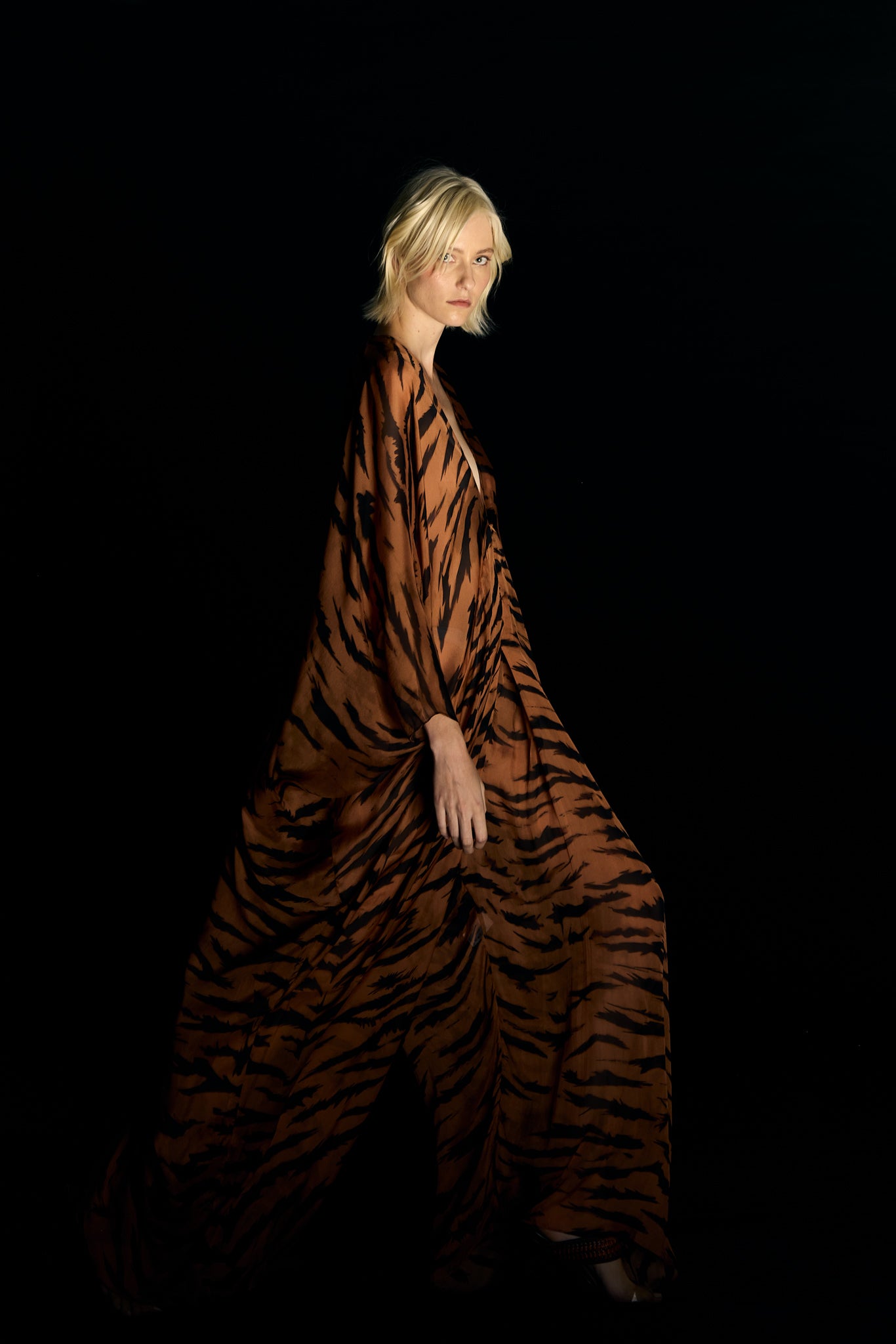 Model wearing the Jampsuit concept from the Adriana Degreas and Sabine Getty collab with 100% Silk styled for a casual look.