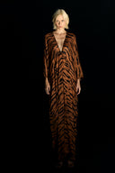 Model wearing the Jampsuit from the Adriana Degreas and Sabine Getty collab with 100% Silk styled for a casual look.