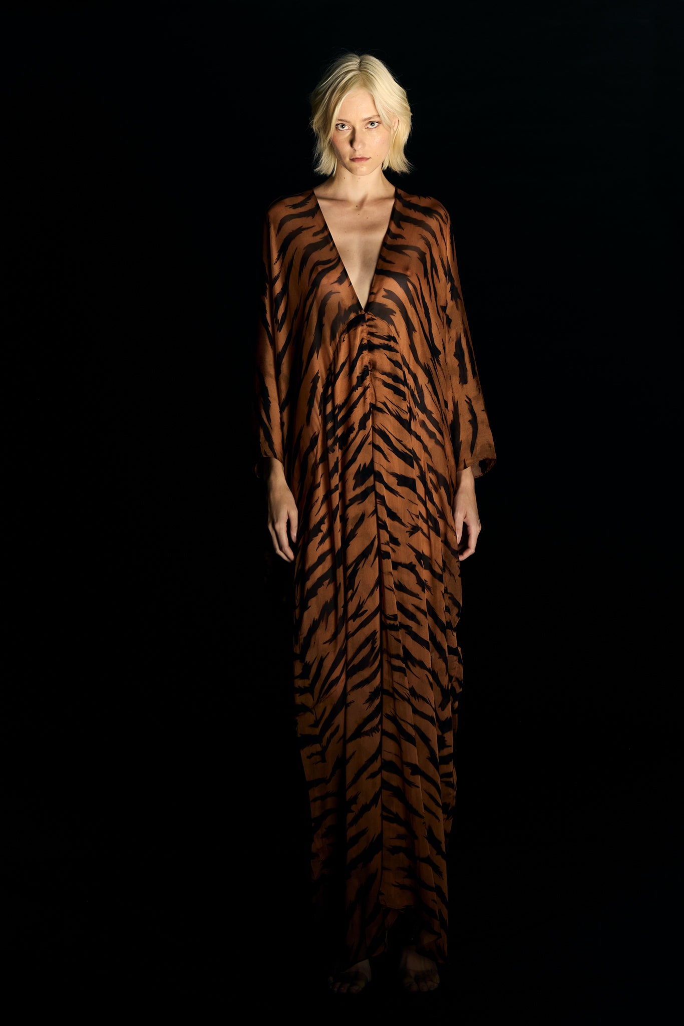Model wearing the Jampsuit from the Adriana Degreas and Sabine Getty collab with 100% Silk styled for a casual look.