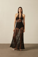 Model wearing the Lace Bare-Back Long Dress black front from the HS25 with 56% Polyamide 44% Cotton styled for a dinner and drinks look.   