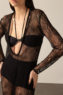 Model wearing the Lace Plunge-Neck Long Dress black detail  from the HS25 with 100% polyamide styled for a dinner and drinks look.  
