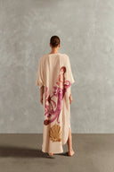 Model wearing the Le Sirenuse Buttoned Midi Kaftan Back showcasing its Lilac color on 100% Silk fabric, styled for an afternoon look.