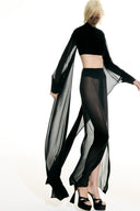Model wearing the Maxi Skirt and Wide Sleeve Top Set detail from the Adriana Degreas and Sabine Getty collab with 100% Silk styled for a dinner look. 