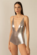 Model wearing the Metallic V-Neck Swimsuit silver detail from the HS25 with 92% POLYESTER 8% ELASTANE styled for a pool party look.   