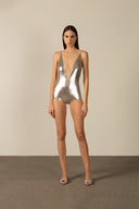 Model wearing the Metallic V-Neck Swimsuit silver front from the HS25 with 92% POLYESTER 8% ELASTANE styled for a pool party look.   
